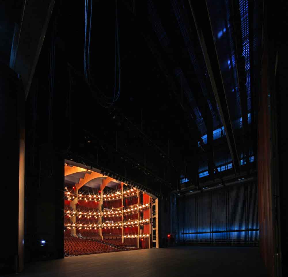 Hylton Performing Arts Center 1300-seat Merchant Hall stage with blue worklights.